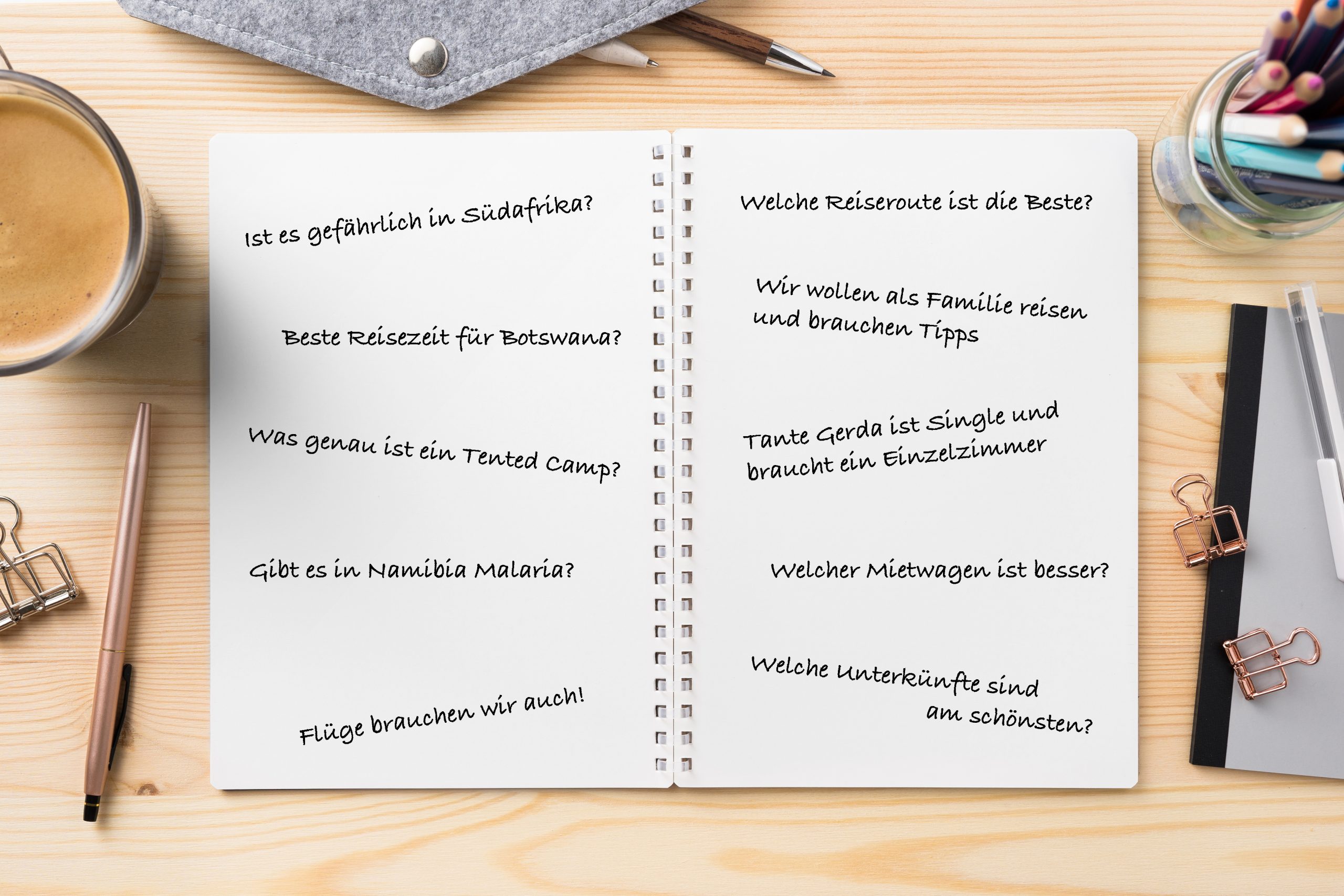 Top view of lot of stationary, like black spiral notebook and wood mechanical pencil…etc on wood table background